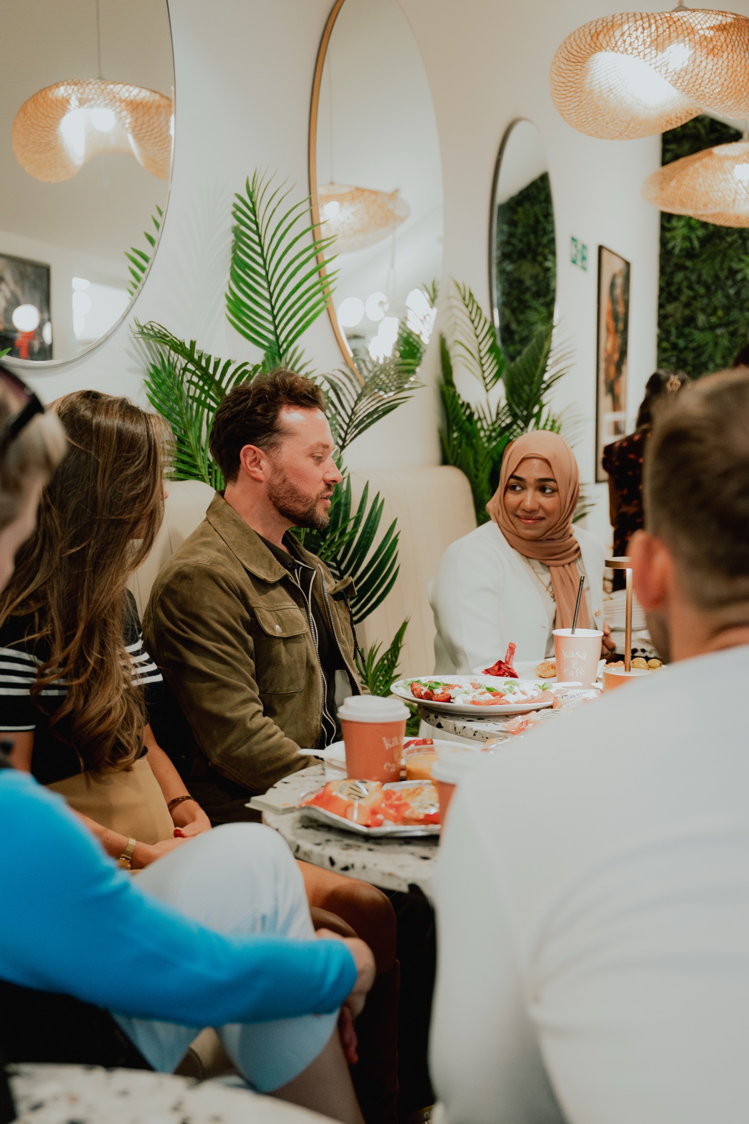 Thomas in conversation with members at the London brunch